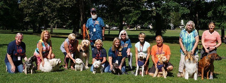 RocDog volunteers with their certified dogs